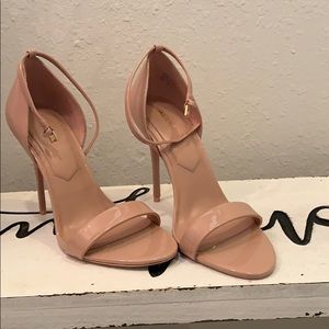 Brand new never worn. Nude Aldo Strappy heels.
